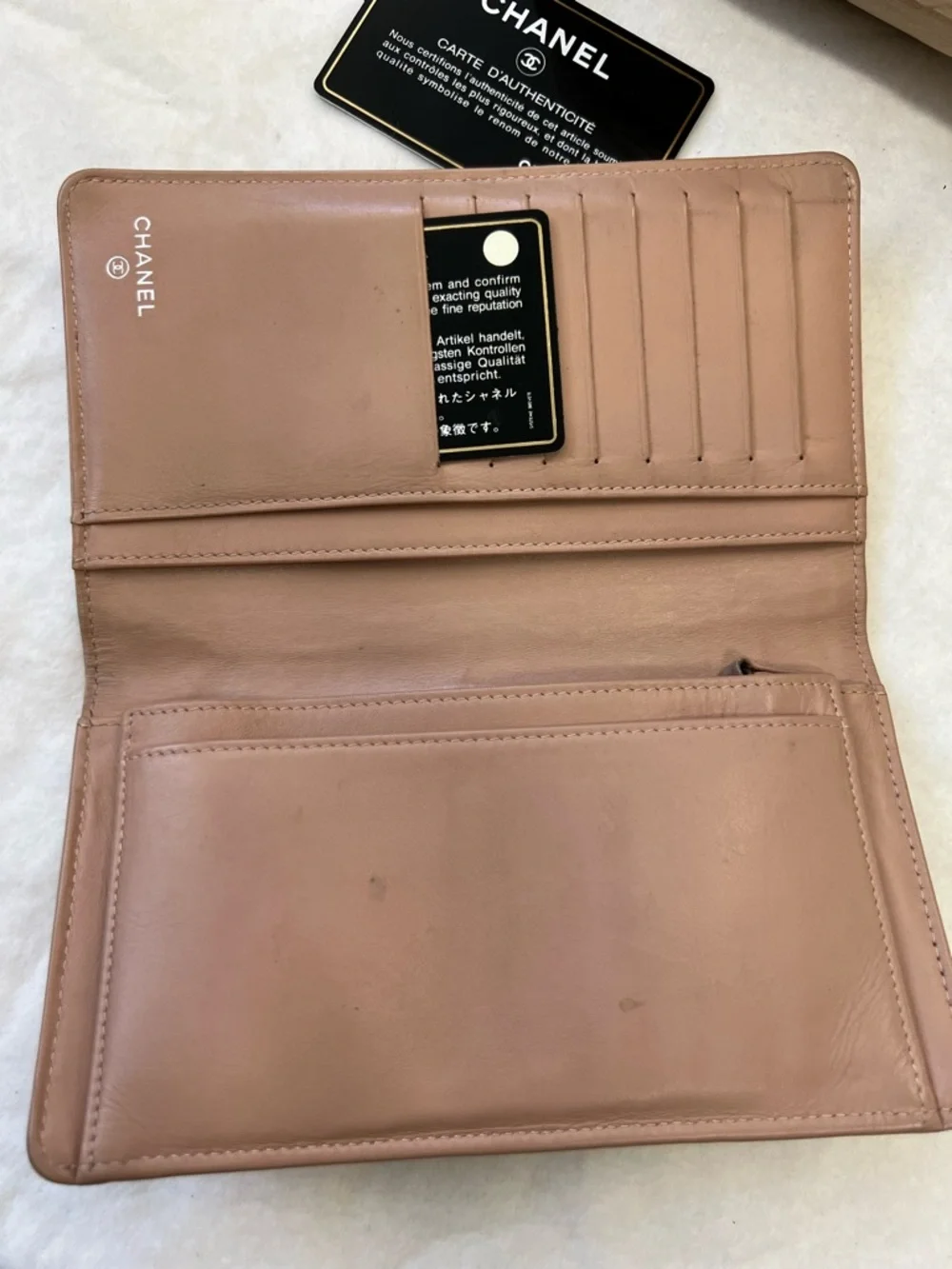 CHANEL Beige Quilted Leather Drawstring Backpack with CC with wallet